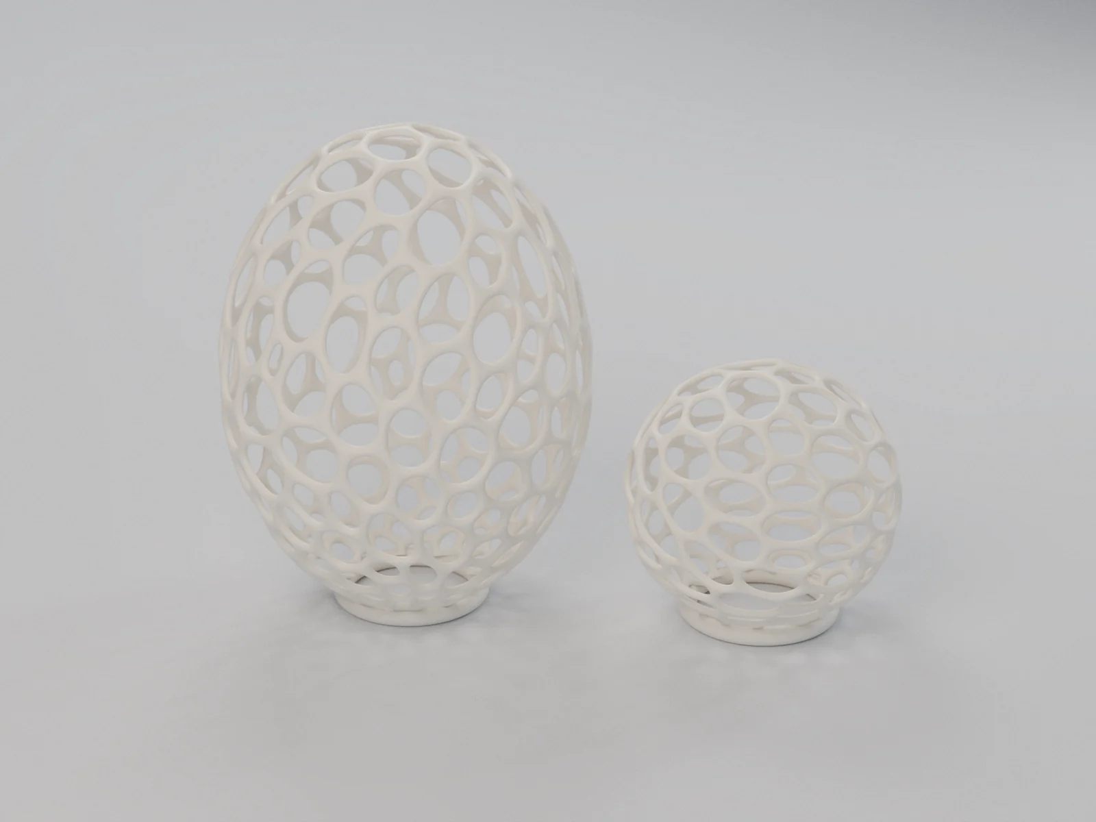 Render ilustrativo: dos esculturas de celosía paramétrica en PLA blanco